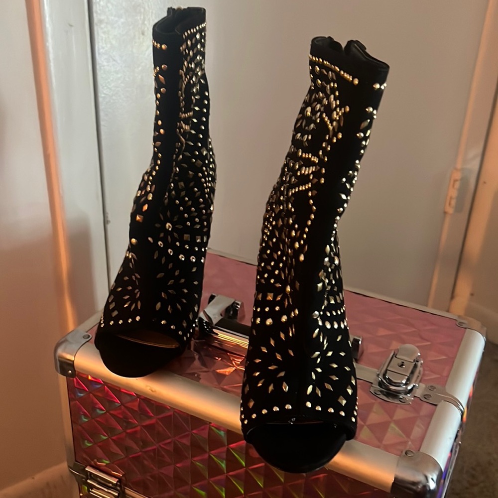 Beautiful black and gold booties, brand new never worn